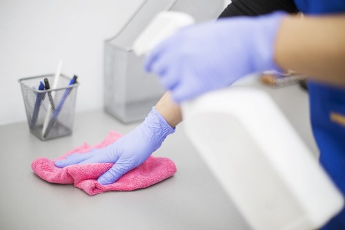 Cleaning team managing payment and service records