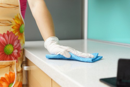 Commercial cleaning team working in an Islington office reception area