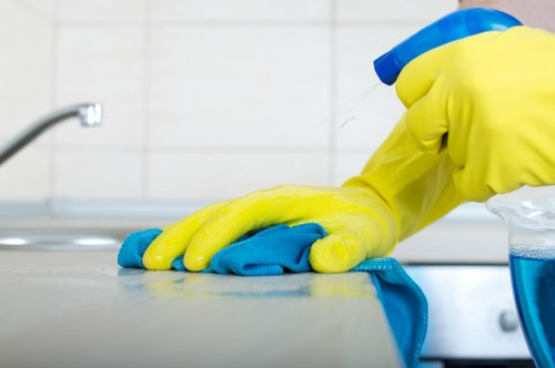 Cleaner applying safe chemical handling procedures