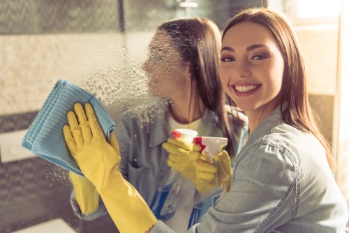 Office cleaner maintaining a workspace in Islington